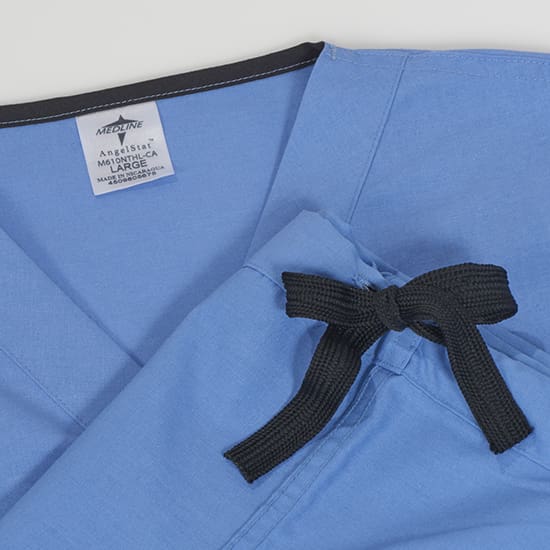 blue medical scrubs code detail up close